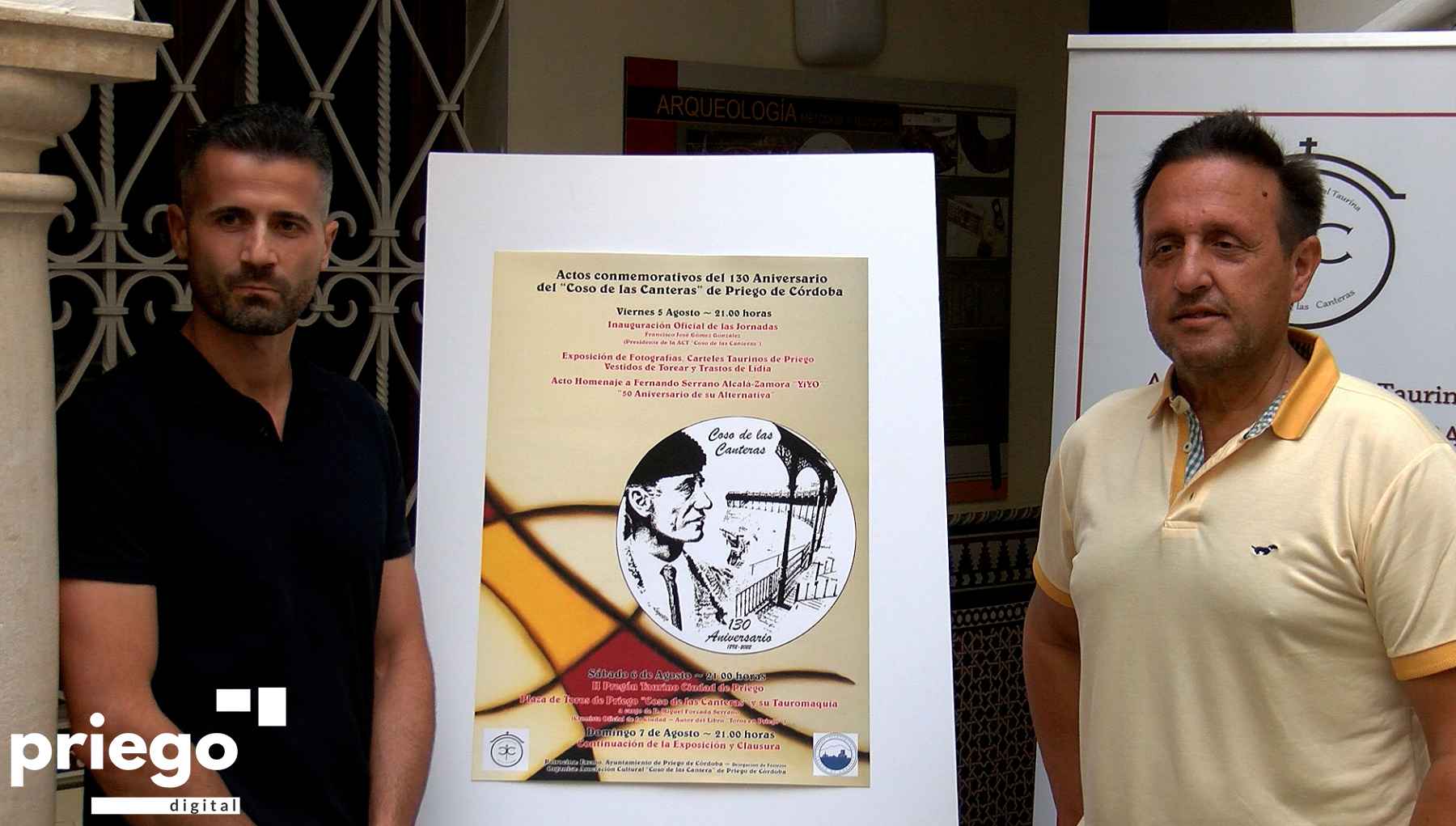 Gómez e Ibáñez junto al cartel anunciador.